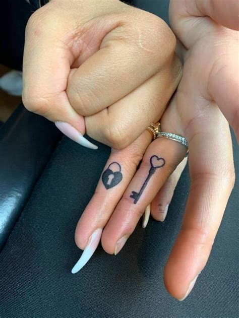 couple finger tattoos